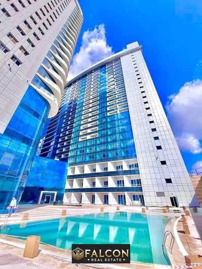 Luxurious apartment, first row on the Nile, immediate delivery, fully finished, with Hilton hotel services, in the Nile Pearl Towers