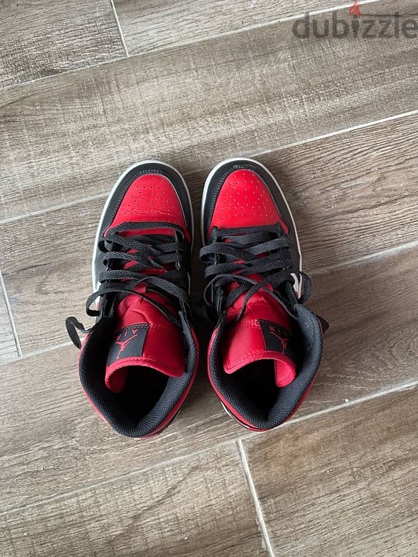 Jordan 1 mid red and black 5