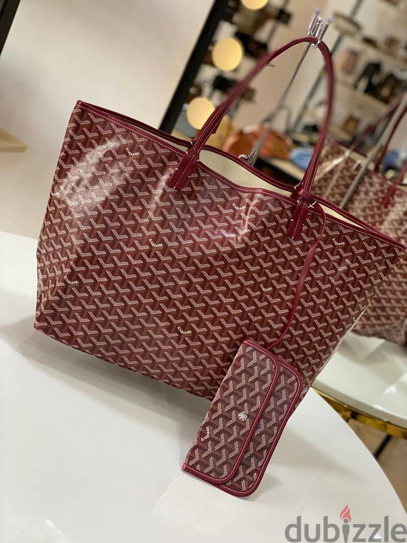 "أناقتك في كل وجه!"  "Style in Every Switch "  Goyard  Double face 0