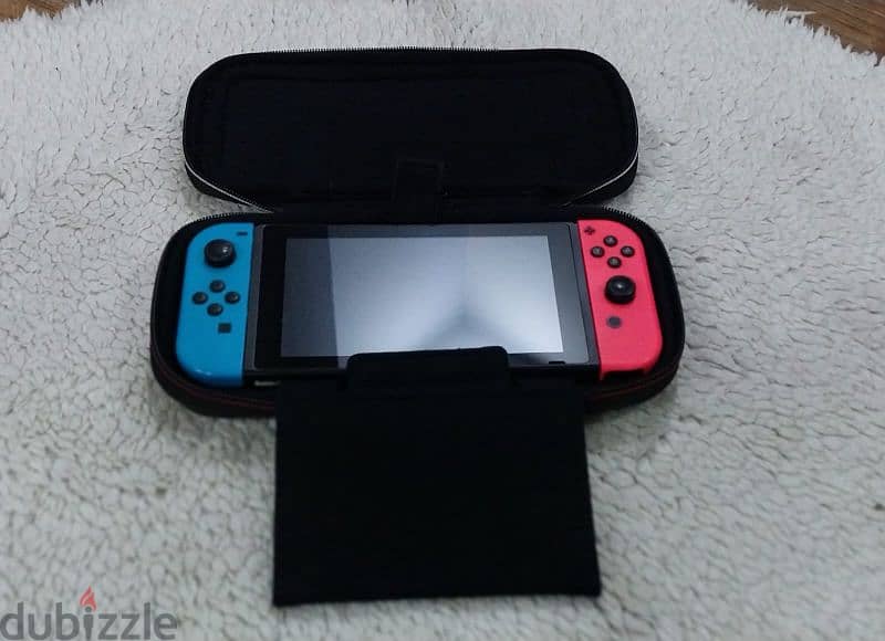 Nintendo Switch Used in perfect condition with Accessories 10