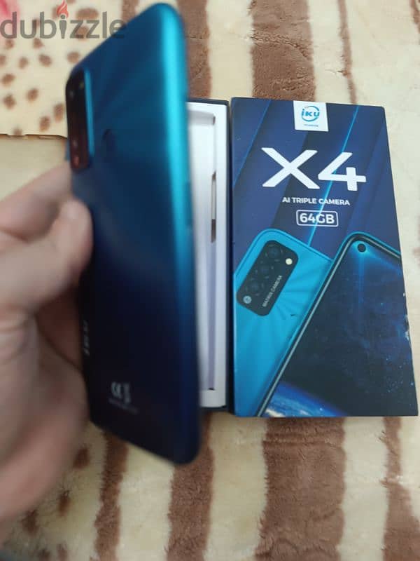 موبيل IKU X4  الرام ٤ والمساحة ٦٤ جيحا بالكرتونة والجراب 12