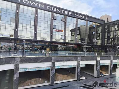 Commercial store for sale in the strongest mall in Shorouk City, Town Center, price 4,760,000