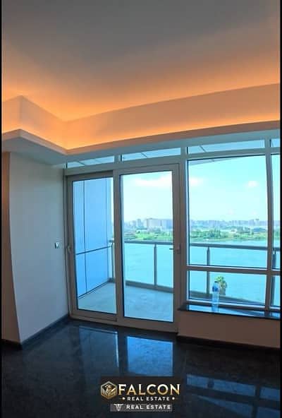 Apartment for sale with a luxurious view of the Nile, for sale, fully finished with air conditioners, under the management of the Hilton Hotel