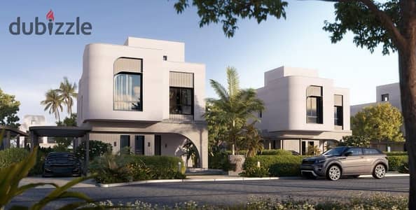 Detached villa with lagoon view in Owest Samih Sawiris in front of Mall of Egypt in installments