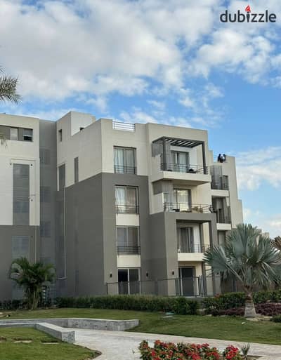 Apartment with garden for sale, fully finished, in Palm Hills, Sheikh Zayed