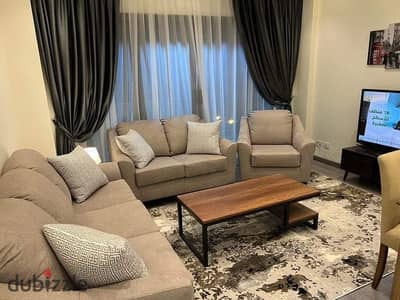 In front of Tolip Hotel a fully finished hotel apartment with hotel services on El-Thawra Street fully finished with furniture