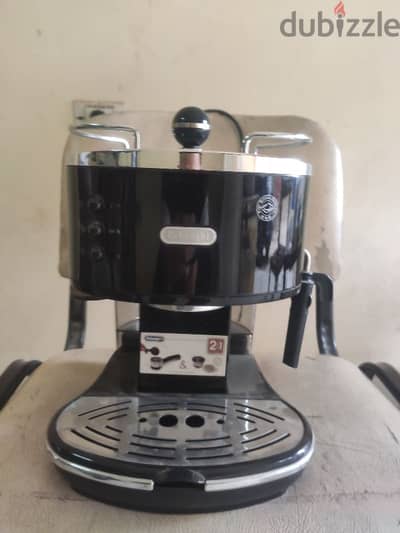 ماكينه قهوه delonghi ممتازه جدا وبحالة ممتازه جدا