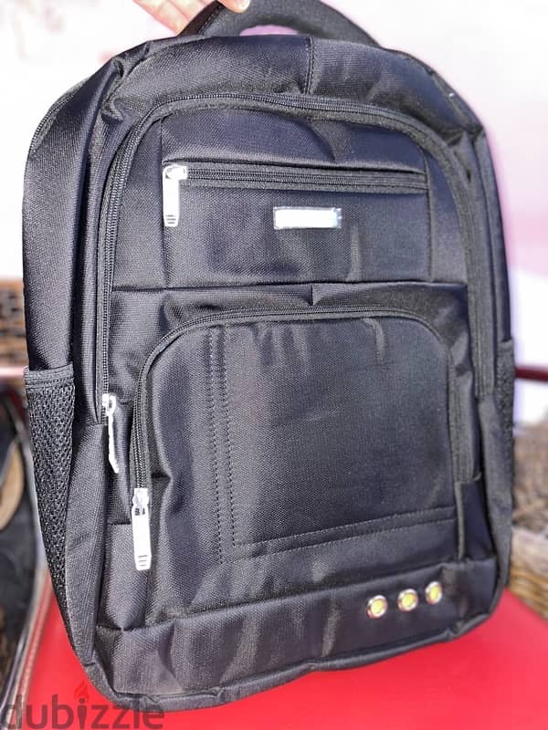 شنطة ضهر جديدة للجنسين باللون الأسود Black backpack 2