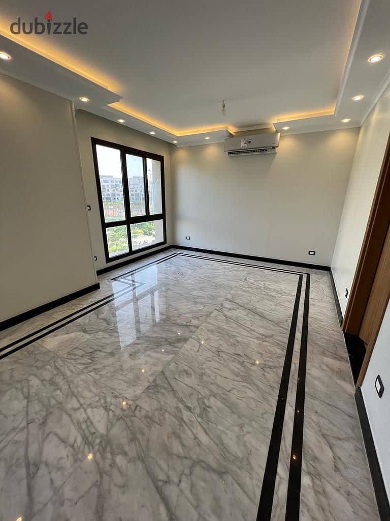 شقة للبيع 128م متشطبة بالتكيفات فى التجمع السادس قسط على 8 سنين بكمبوند crescent walk marakez بعد الجامعة الأمريكية التجمع الخامس 0