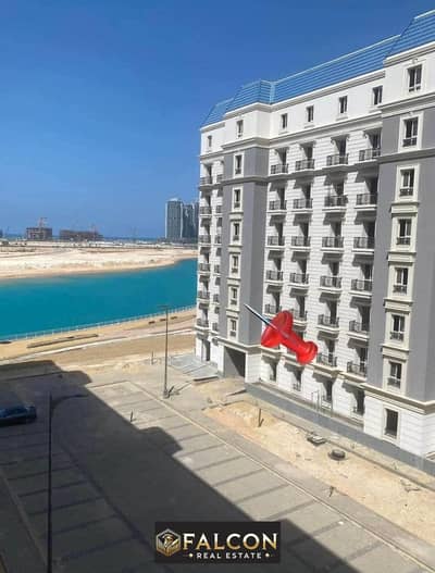 Apartment 145 m 3 rooms double view El Alamein Towers and Lagoon immediate delivery fully finished in installments in the Latin Quarter El Alamein Lak