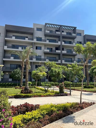 Apartment for sale in installments, fully finished, in a very distinguished location on a very distinguished landscape view in Amdad Compound, New Cai