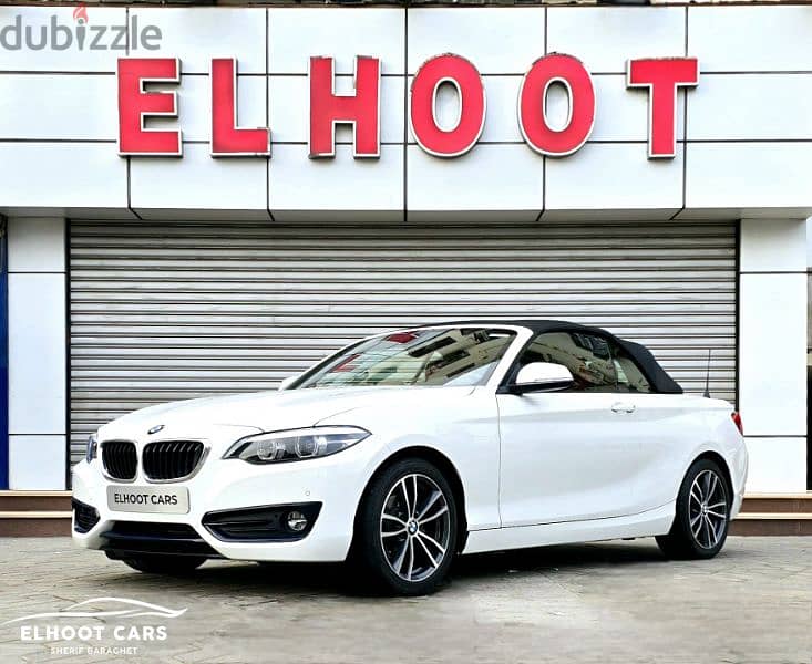 BMW 218I لون مميز أبيض فرش احمر ٤كم فقط 0