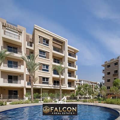 For sale, an apartment at a special price in the heart of the compound, directly on the Suez Road, next to Cairo Airport, in the TAJ CITY compound, wi