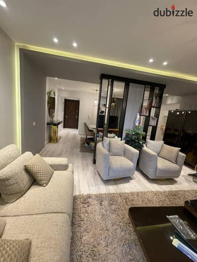 Apartment for sale in front of the Diplomatic Quarter and the Green River ground floor with a private garden in the best location in New Cairo Dejoya