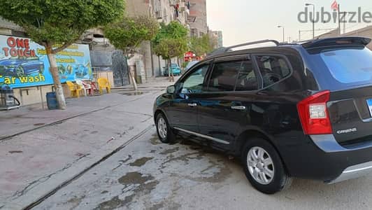 Kia Carens 2009 فيريكة سقف وشنطة