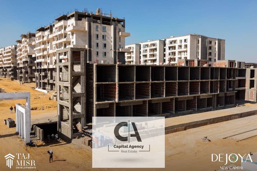 Own a 3-room apartment with a down payment of 390 K. with a private terrace in the New Capital next to the American University in Tag Misr _ De joya 0