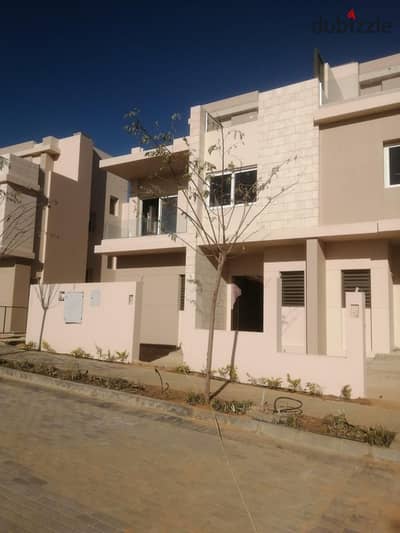 Twin house villa for sale in Towny Compound next to Palm Hills, immediate delivery, installments over 8 years