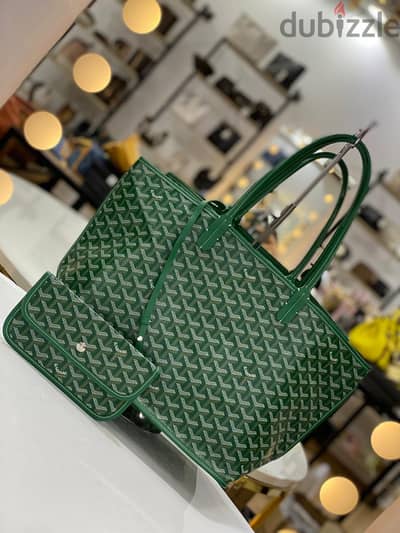 "أناقتك في كل وجه!"  "Style in Every Switch "  Goyard  Double face