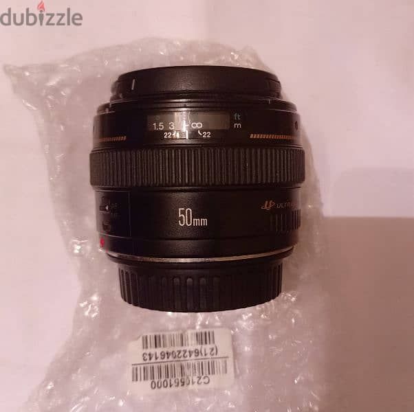 عدسة 50mm 1.4 كانون 0