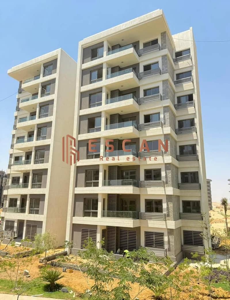 For sale in installments over 15 years, 131-meter apartment, resale, old reservation, less than the company’s price, open view on a street, parking, a 0