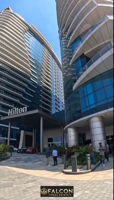 First row apartment on the Nile Corniche, Maadi, immediate delivery, fully finished, and with Hilton Maadi Hotel services