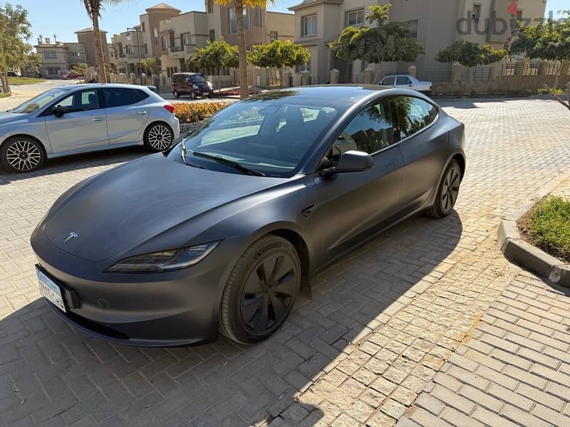 Tesla Model 3 AWD 2024 face left 0