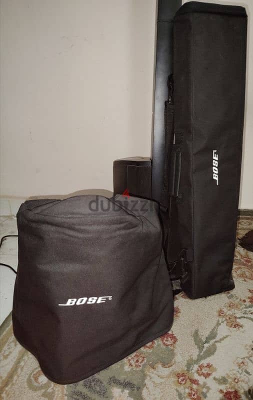 Used like new bose L1 compact with all cases 1