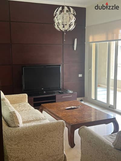 Apartment for sale in the village palm hills new cairo