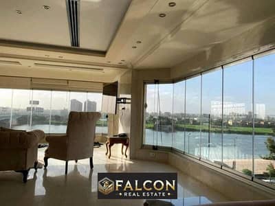 For sale, a first-row apartment on the Nile, fully finished with air conditioners, furniture and appliances, in the Reef Do Nile Towers, with installm