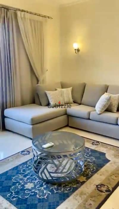 Studio for rent in the village palm hills new cairo