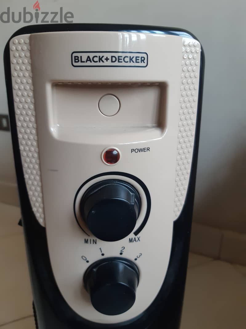 Black and Decker دفاية بلاك اند ديكير ١٣ ريشة مع مروحة بحالة الجديدة 1