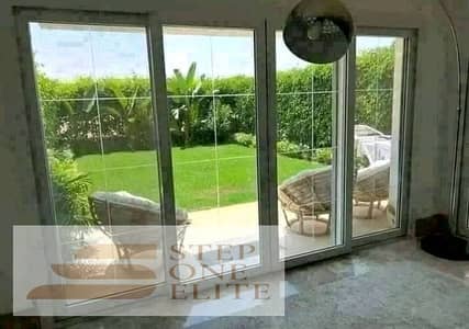 Apartment for sale (ground + garden) with a view over the landscape + 42% cash discount + installments on Suez Road in Sarai Compound next to Madinaty