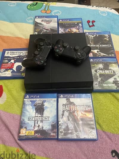 ps4 fat 1 tb ب 7 سيديهات مميزه و دراعين اصليين