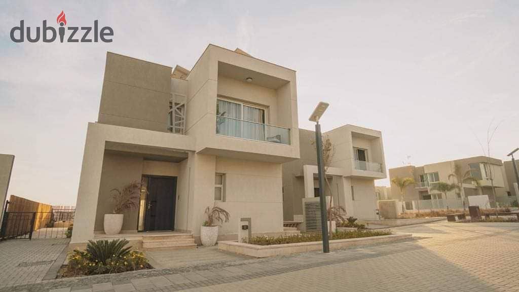 townhouse villa for sale near Mall of Egypt with a down payment of 267,000 EGP, and the remaining amount can be paid in installments over 12 years. 0