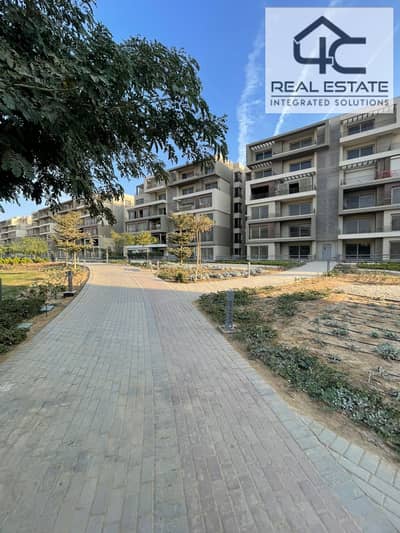 Ready to move apartment with garden corner 4 bedrooms master in prime location Landscape view for sale in Palm Hills New Cairo