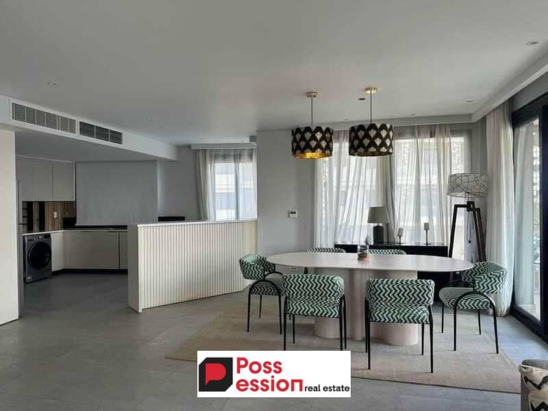 Apartment for sale in Taj City Compound, New Cairo, 3 rooms, open view, green area, in front of the airport, near Heliopolis and Nasr City, with a 50% 0