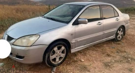 Mitsubishi Lancer 2006 لانسر بومة لنسر