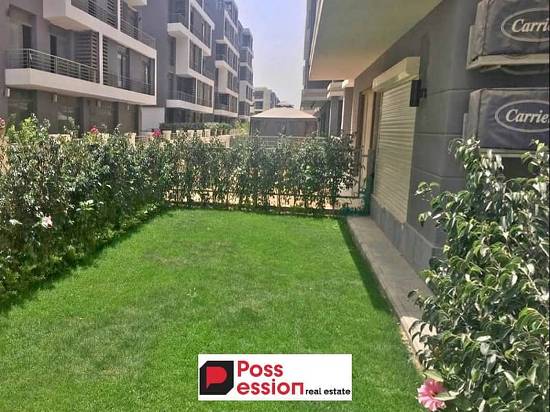 Apartment with garden for sale in Taj City New Cairo Compound in First Settlement on Suez Road in front of Cairo airport and minutes from Nasr City 0