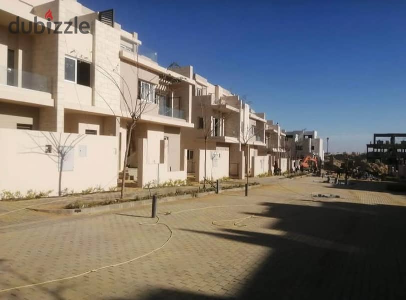 Twin house, immediate delivery, in front of Al Gezira Club and next to Palm Hills October. 0