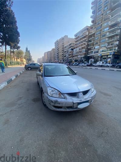 Mitsubishi Lancer 2006 لانسر بومة لنسر