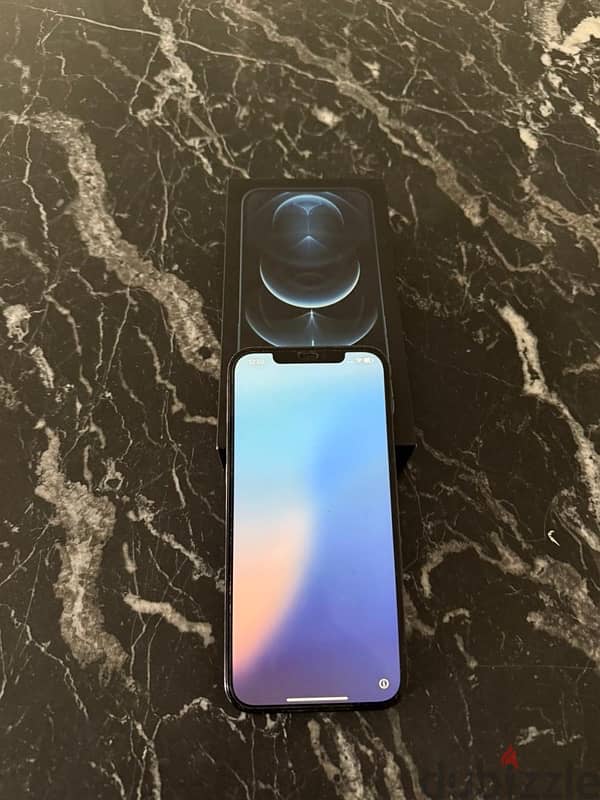 IPhone 12 pro max 128 titanium blue face id as new/ايفون ١٢ برو ماكس 5