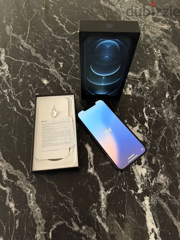 IPhone 12 pro max 128 titanium blue face id as new/ايفون ١٢ برو ماكس 8