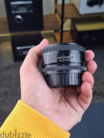 عدسه نيكون 50mm f1.8 d حاله كويسه