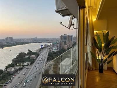 First row on Maadi Corniche Hotel apartment [finished+ furnishings +ACs] view on Nile REVE DU NIL Tower next to Hilton with highest rental yield