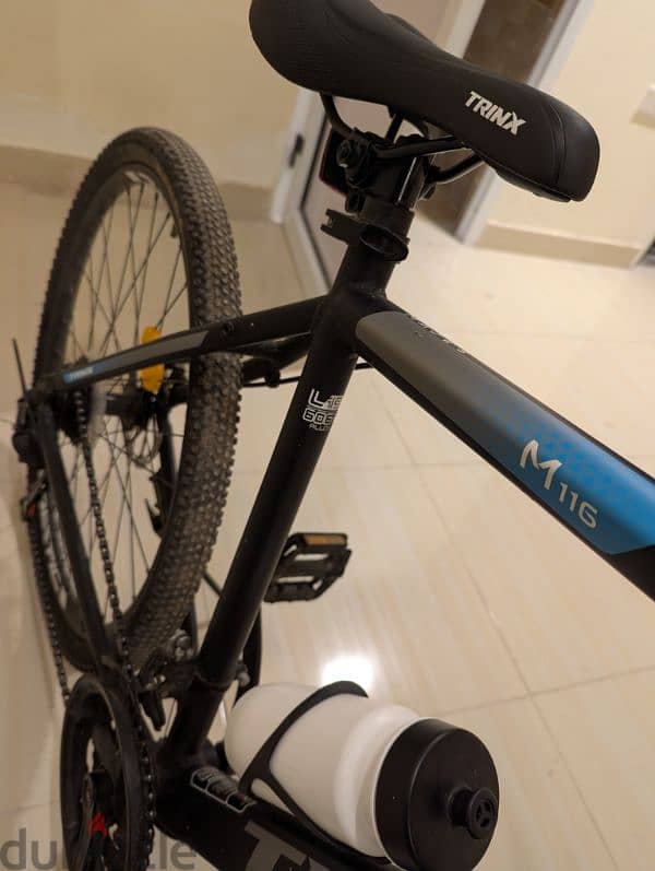 Trinx m116 bicycle + اكسسوارات 1