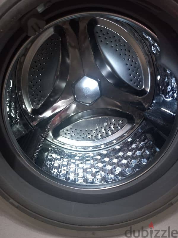 مواصفات غسالة دايو 9 كيلو تعبئة أمامية – فضي Daewoo washing machine 1