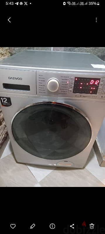 مواصفات غسالة دايو 9 كيلو تعبئة أمامية – فضي Daewoo washing machine 11