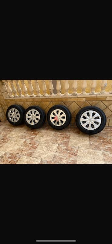 Toyota Corolla tyres with their car rims 10/10 condition