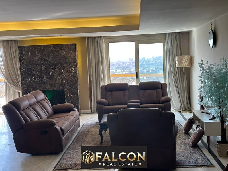 Hotel apartments for sale with a fantastic view of the Nile Corniche, with air conditioning and furniture, in the Reef du Nil Tower 0