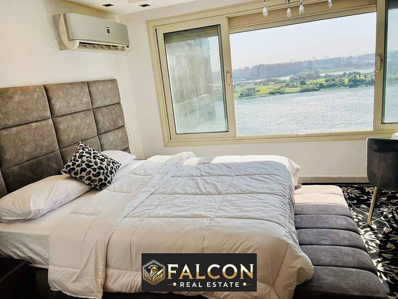 Pay in cash and receive a fully finished apartment with furniture, appliances and air conditioners, with a direct view of the Nile in Cairo 0